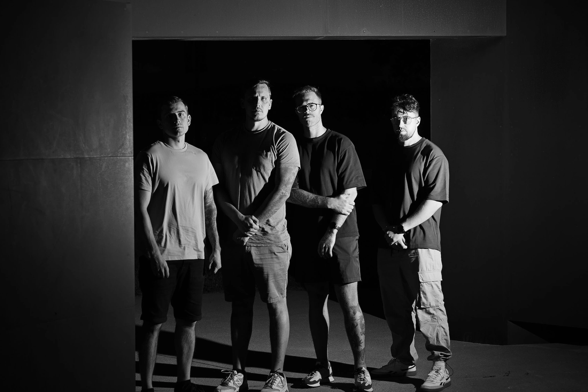 Frontières, photographed together in a doorway